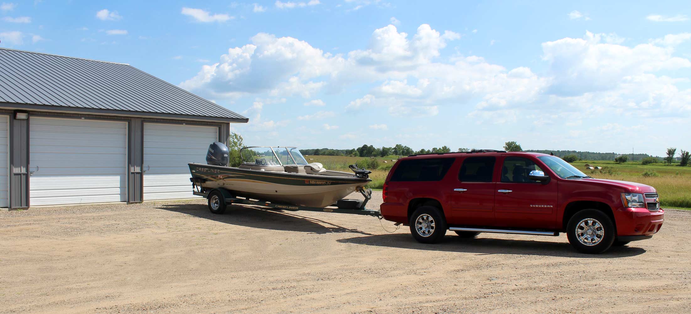 Fishing boat in front of a storage unit at Strack's Self Storage in Randall, MN